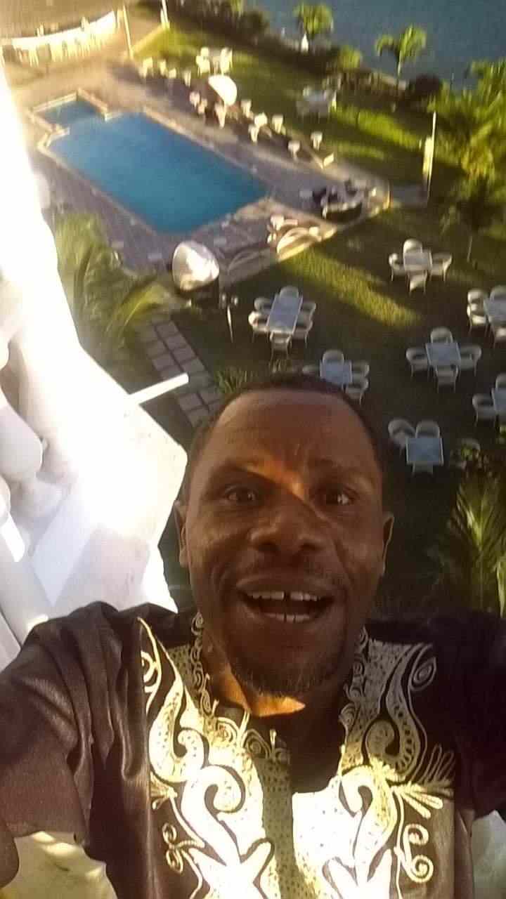Selfie overlooking a resort pool