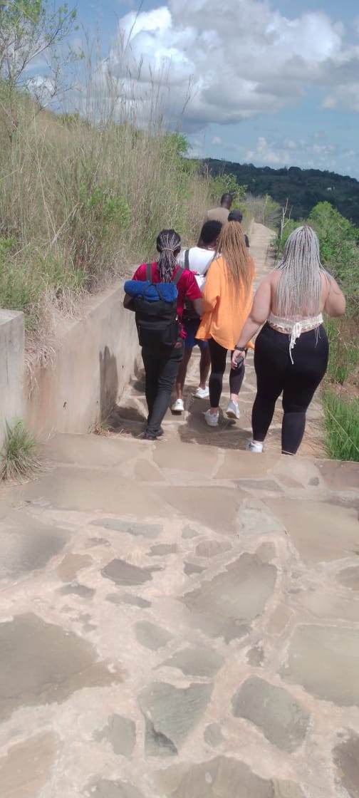 Hikers on a stone path