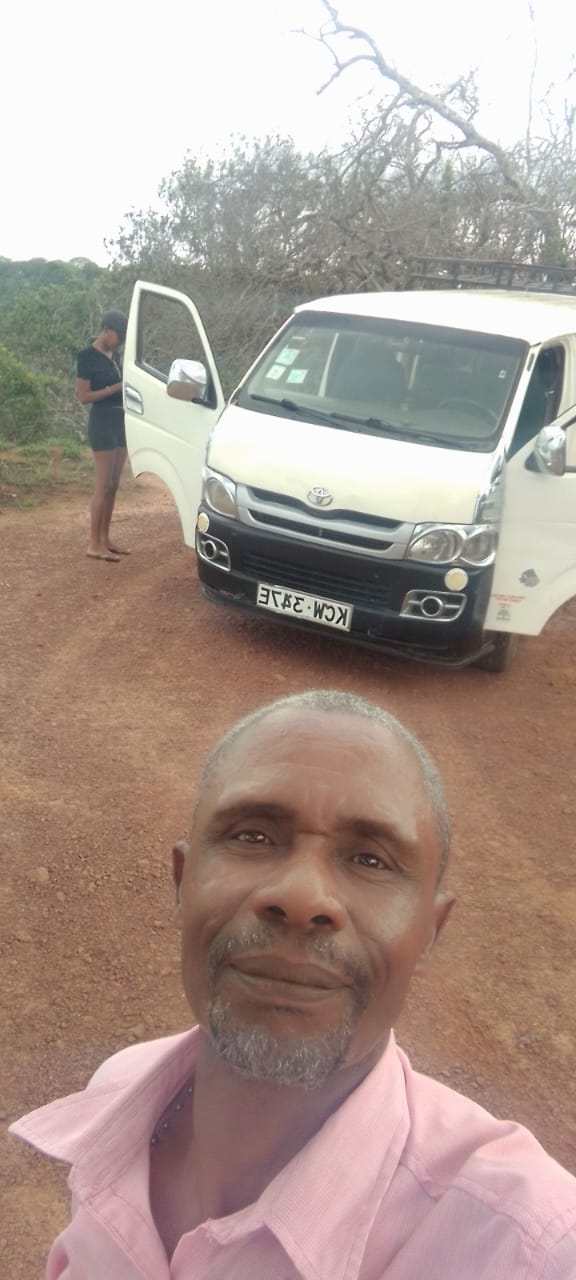 Your guide with the safari van on a transfer run