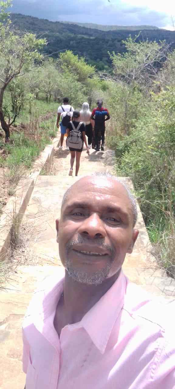 Guide selfie leading the group down