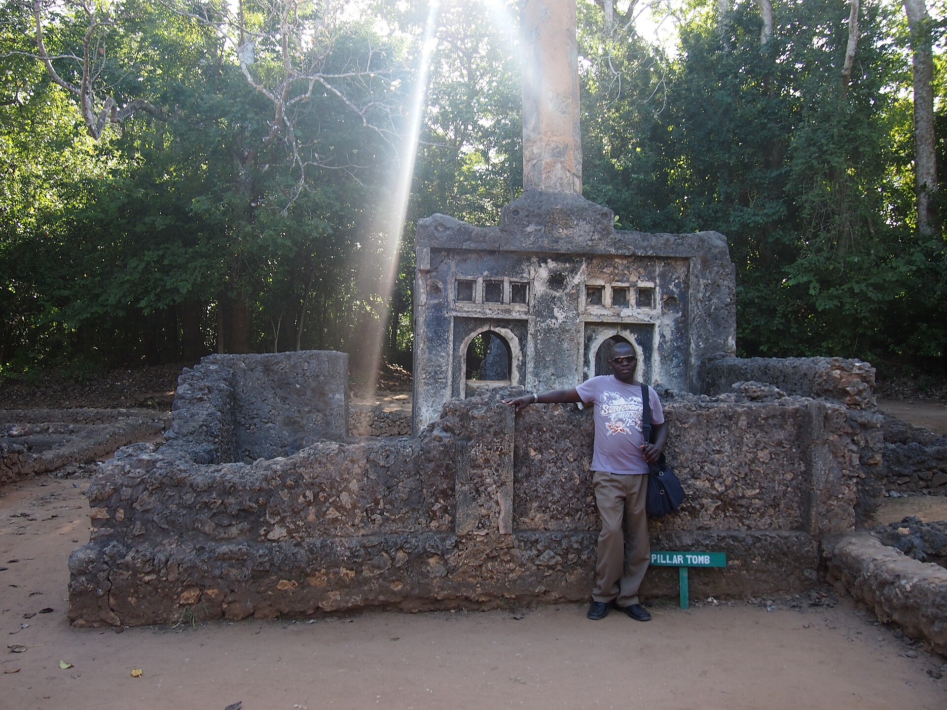 Ancient stone ruins of Gedi among forest trees near Watamu